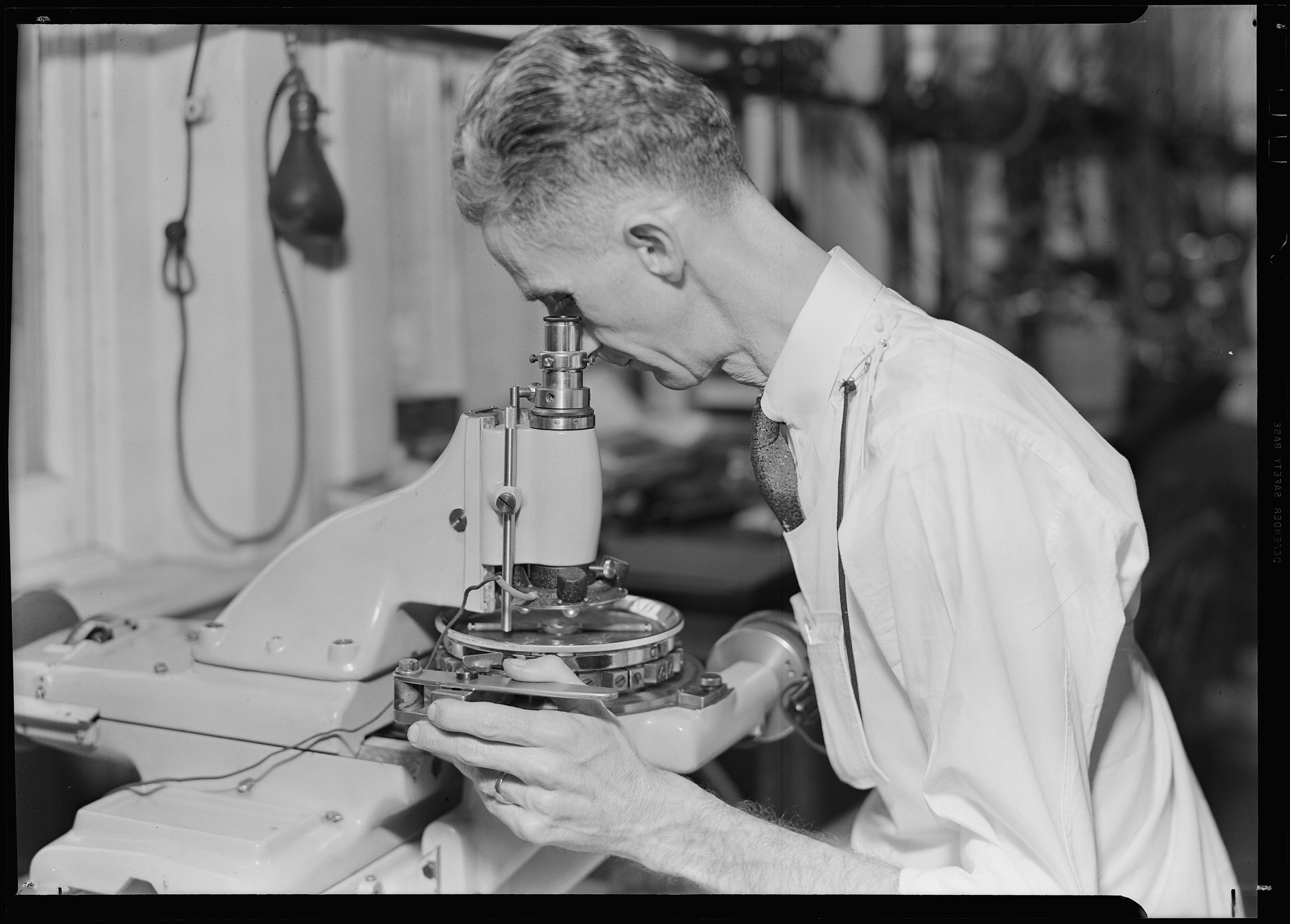 Optical inspection station used to examine edge condition and feature geometry during finish validation.